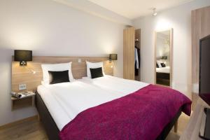Cama o camas de una habitación en Thon Partner Elgstua Hotel