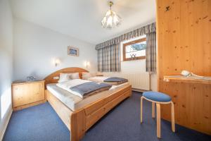 Postel nebo postele na pokoji v ubytování Haus Benjamin