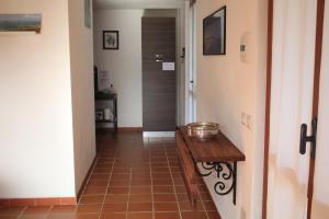 TV a/nebo společenská místnost v ubytování B&B Sa Serra