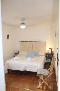 Postel nebo postele na pokoji v ubytování B&B Sa Serra