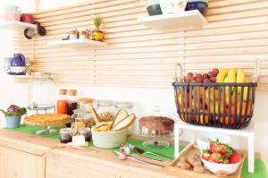 a kitchen counter with a bunch of food on it at PURA B&b in Noicattaro