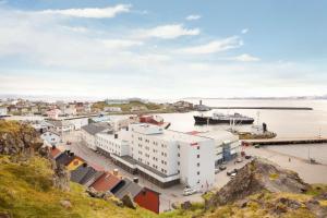 an aerial view of a town next to the water at Scandic Honningsvåg in Honningsvåg