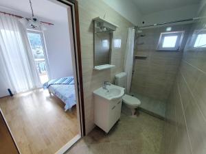 Koupelna v ubytování Apartment LANKA