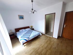 Postel nebo postele na pokoji v ubytování Apartment LANKA