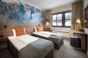 
En eller flere senger på et rom på Scandic Hafjell
