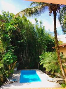 Swimmingpoolen hos eller tæt på Pousada Azul Banana - Camburi