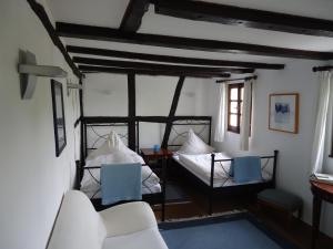 Ένα ή περισσότερα κρεβάτια σε δωμάτιο στο Am Alten Fronhof