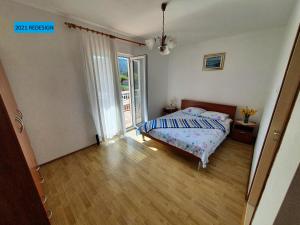 Postel nebo postele na pokoji v ubytování Apartment LANKA