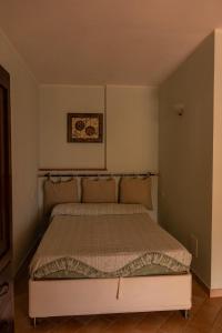 A bed or beds in a room at Agriturismo Mercurio