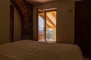 A bed or beds in a room at Agriturismo Mercurio