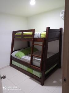 two bunk beds in a room at Citadela Di Aqua in San Jerónimo