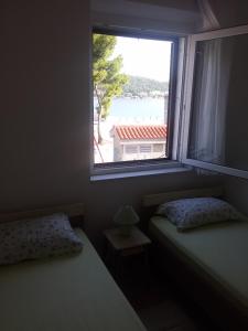Postel nebo postele na pokoji v ubytování Guesthouse Dante