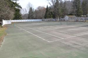 a tennis court with two tennis courts at Edelweiss Ski Lodge in Ellicottville