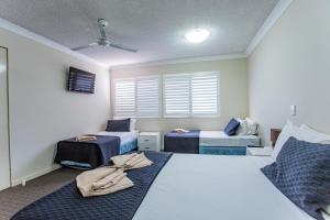 Postel nebo postele na pokoji v ubytování Tropicana Motel