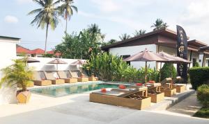 Bazén v ubytování Maya Resort Samui - Family resort-Sha Plus Extra nebo v jeho okolí