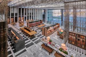 an overhead view of the lobby of a building at Mumian Beijing Daxing International Airport in Beijing