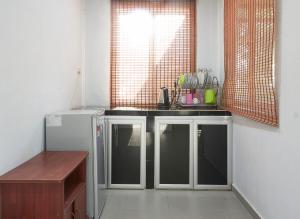 A kitchen or kitchenette at Corrie Chalet Langkawi