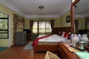 Postel nebo postele na pokoji v ubytování New Hotel Panda