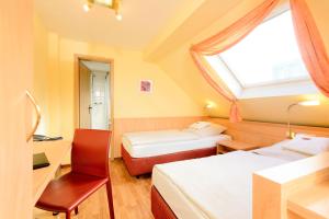 Ένα ή περισσότερα κρεβάτια σε δωμάτιο στο Hotel Europa