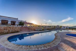 a swimming pool in the middle of a building at Bungalow double 20 - El Cortijo Chefchaoeun Hotel Spa in Chefchaouene