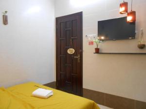 TV a/nebo společenská místnost v ubytování Thanh Hằng Homestay + 37 fotografií