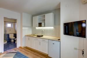 Kuchyň nebo kuchyňský kout v ubytování Gyapay Apartman Hévíz