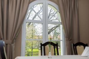 Łóżko lub łóżka w pokoju w obiekcie Hotel Vis a Vis Łańcut