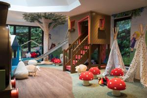 a childrens room with a play area with mushrooms at The Gleneagles Hotel in Auchterarder