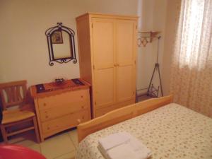 A bed or beds in a room at Residence Massilor