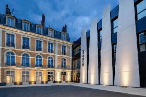an external view of a building at Leprince Hotel Spa; Best Western Premier Collection in Le Mans