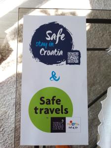 Certifikát, hodnocení, plakát nebo jiný dokument vystavený v ubytování Apartmani Paula