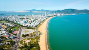 an aerial view of a beach and the ocean at SUNSHINE HOTEL in Quy Nhon
