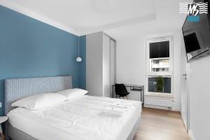 Televízia a/alebo spoločenská miestnosť v ubytovaní MS Apartments Sky Tower X