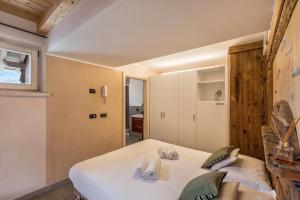 A bed or beds in a room at Ice Chalet 3 Elements