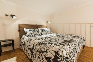 Postel nebo postele na pokoji v ubytování San Berillo home