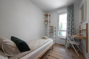 Ein Bett oder Betten in einem Zimmer der Unterkunft ACOGEDOR APARTAMENTO a 10 MINUTOS de la CIUDAD