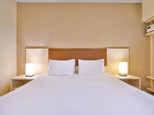 Postel nebo postele na pokoji v ubytování Thermas de Olimpia Resort