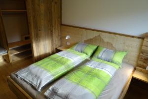 Postel nebo postele na pokoji v ubytování Schmalzlhof
