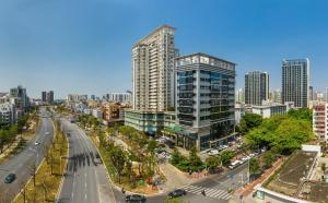 an aerial view of a city with tall buildings at Holiday Inn Express Shenzhen Nanshan by IHG in Shenzhen