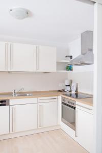 Η κουζίνα ή μικρή κουζίνα στο Apartmenthaus am Tegernsee - Studios mit Küchenzeile und mit Bus erreichbar +67 φωτογραφίες