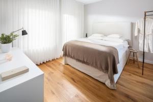 Ein Bett oder Betten in einem Zimmer der Unterkunft Friedrich Inn