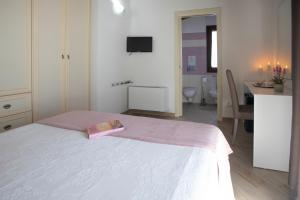 Postel nebo postele na pokoji v ubytování Irilor Luxury B&B