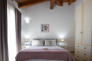 Postel nebo postele na pokoji v ubytování Irilor Luxury B&B
