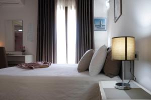 Postel nebo postele na pokoji v ubytování Irilor Luxury B&B
