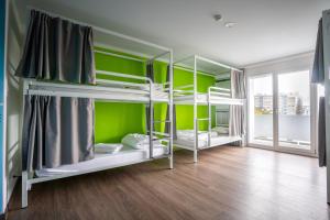 Cama o camas de una habitación en Nyon Hostel