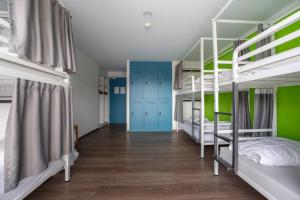 Cama o camas de una habitación en Nyon Hostel