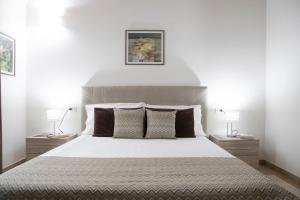 Postel nebo postele na pokoji v ubytování Irilor Luxury B&B