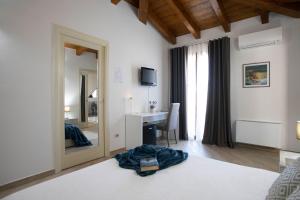 Postel nebo postele na pokoji v ubytování Irilor Luxury B&B