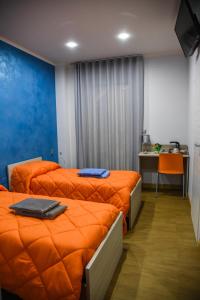 Postel nebo postele na pokoji v ubytování Margherita 2.0
