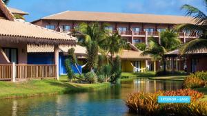 a resort with a river in front of it at Vila Galé Resort Cumbuco - All inclusive in Cumbuco